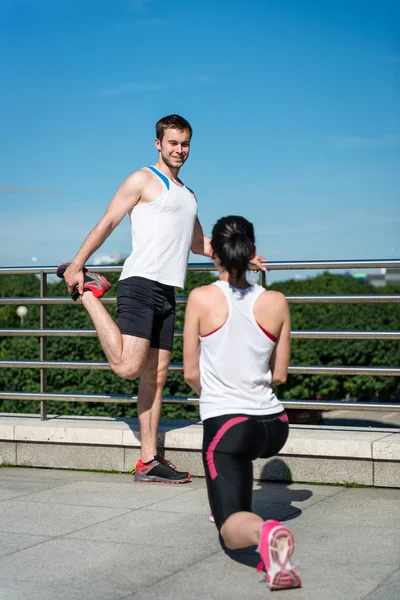 Warm up - couple exercising — Stock Photo, Image