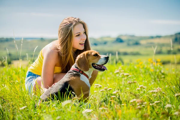 Teenager with her dog — Stock Photo, Image