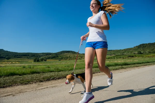 Jogging com amigo animal — Fotografia de Stock