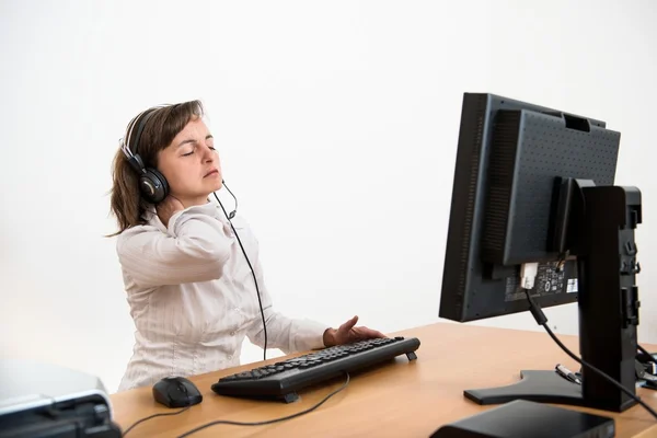 Business woman with neck pain — Stock Photo, Image