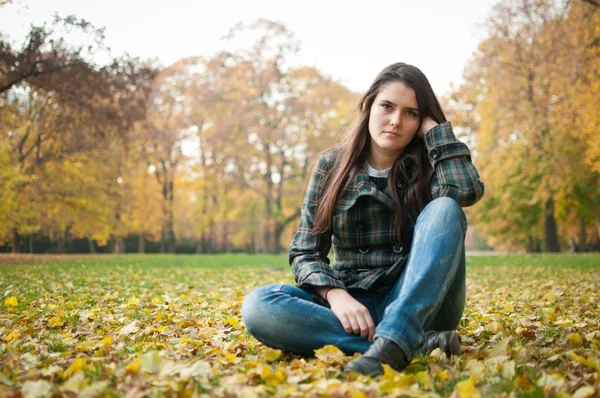 Young woman in depression outdoor — Stock Photo, Image