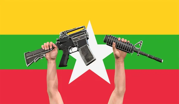 ミャンマーの男は旗の背景に独裁者に対する象徴的な行為で銃を破る — ストック写真