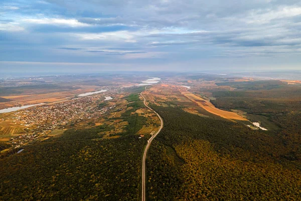 Aerial view of picturesque forests with a highway that crosses woods — Stock Photo, Image