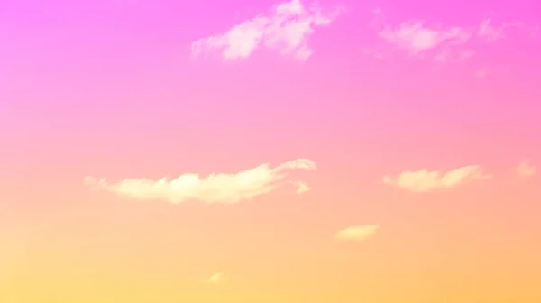 Clouds float in bright colors pink and orange, — Stock Photo, Image