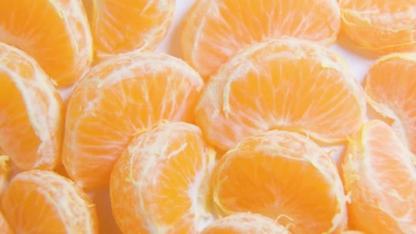 Aus nächster Nähe viele bunte, lebendige frische Zitrusfrüchte Mandarine, — Stockvideo