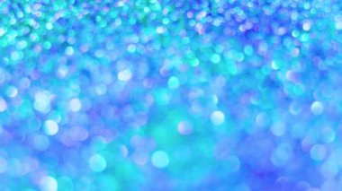 Türkuaz bokeh ile odaklanmış soyut canlı döndürme arkaplanı