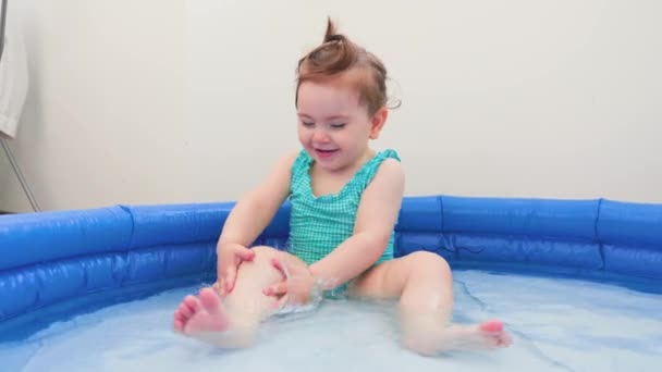 Beautiful Cute Happy Baby Girl Having Fun Small Pool Home — Stockvideo