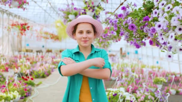 Front View Young Agronomist Girl Greenhouse Woman Crosses Her Arms — Stok Video