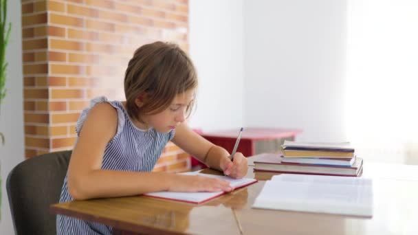 Side View Girl Pupil Sits Table Her Homework Writes Copybook — Αρχείο Βίντεο