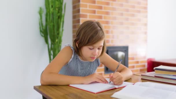 Front View Kid Girl Schoolchild Write Notebook Desk Left Hand — ストック動画