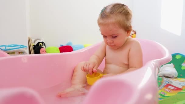 Front View Playing Happy Little Girl Bathing Baby Pink Bath — 비디오