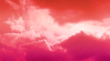 4K Time lapse of vivid multicolored red bright and orange yellow dramatic sunrise or sunset sky and Clouds moving. majestic cloudy sky with sun over horizon. No birds, no flicker.