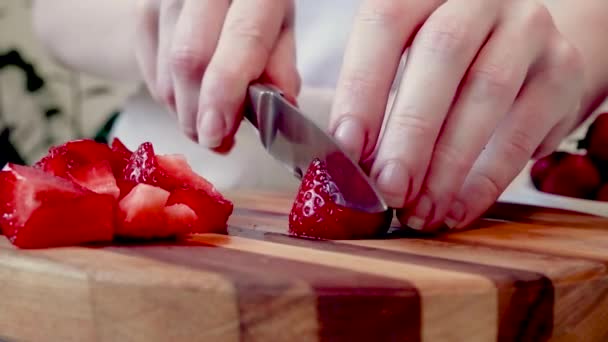 Close Footage Young Womans Hands Neatly Slicing Strawberries Wooden Cutting — Stockvideo