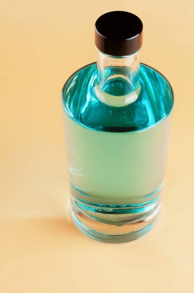 Bottle Blue Gin Light Colored Background — Stock Photo, Image