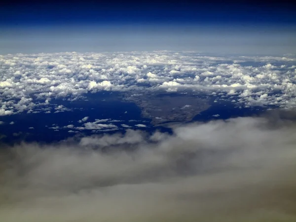 Flight over Baltic sea and white clouds view — Stock Photo, Image