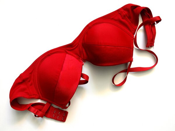 Female red bra isolated on white background 