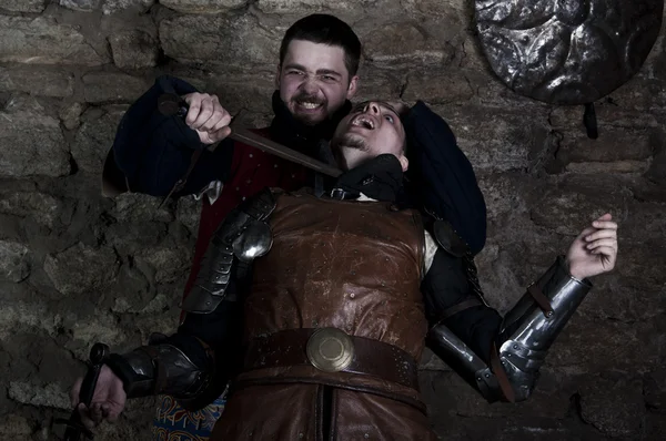 Warrior holding his knife — Stock Photo, Image