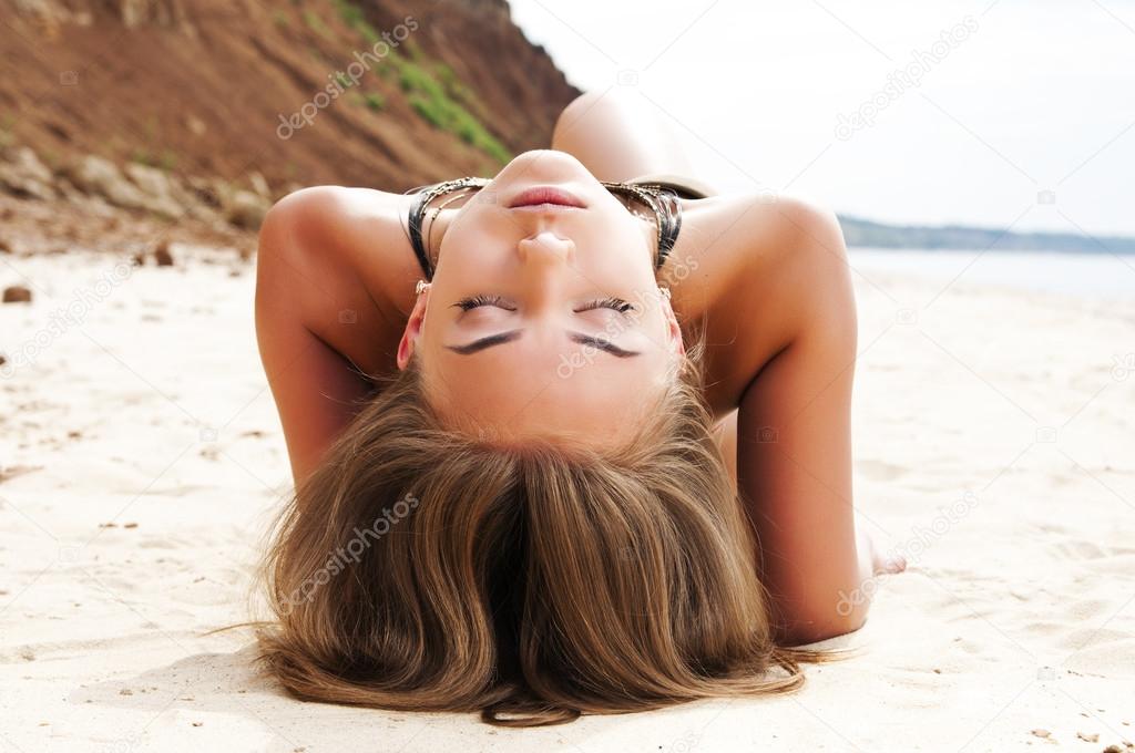 Beach woman lying on