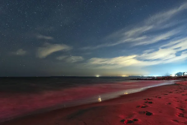 View of the sea on a moonlit night made with long exposure. Night sky. Stars. Ochakov. Ukraine