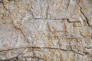 Doku yakın plan antik açık bej mermer. Doğal taş yüzey, tasarım ve duvar kağıdı arka planı için doku kullanımı. Granit soyut desen, doğa bilyesi. Bir metin için yüzey, boşluk