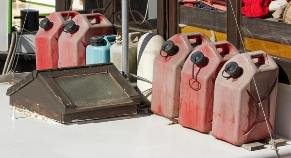 Jerry cans of fuel, reserve on a boat — Stock Photo, Image