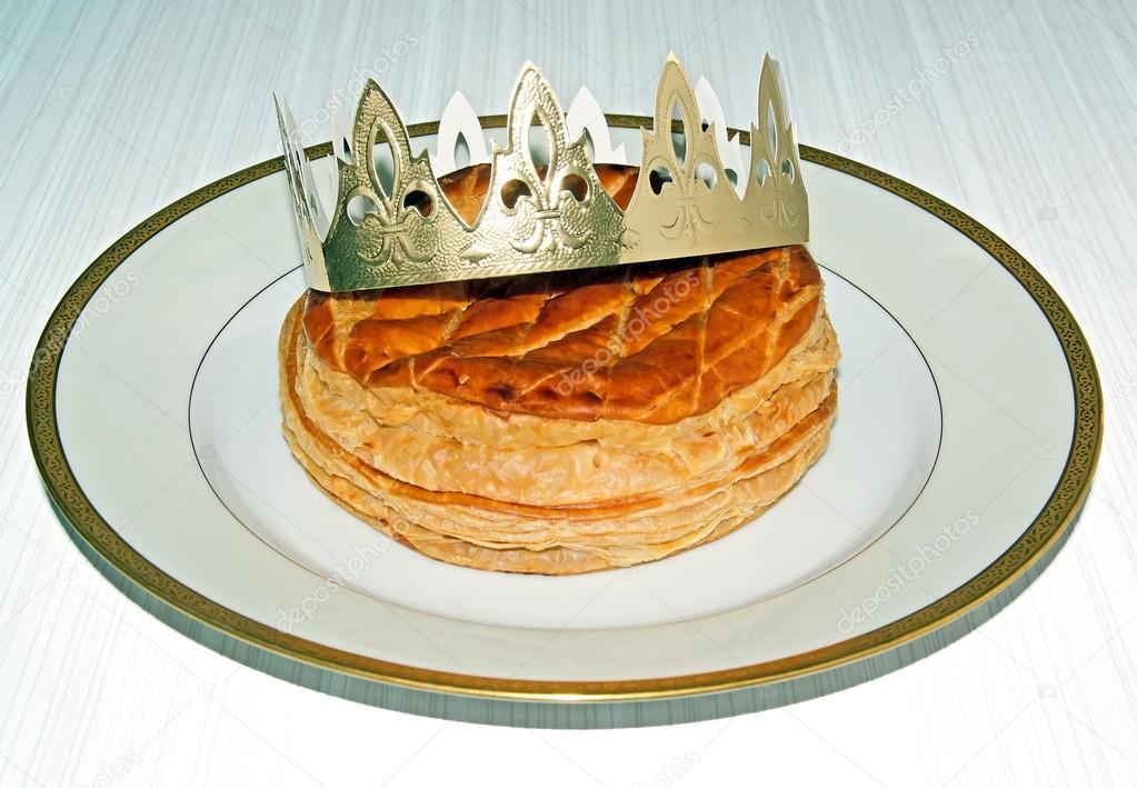 Twelfth-Night pancake and its crown, on kitchen table