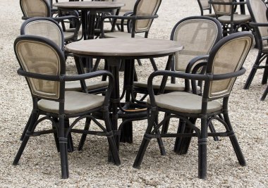 Tables and chairs, outdoor café near Paris (France)