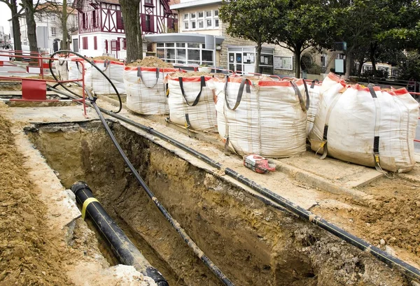 Works of burying of cables, put in correspondence or modernization electricity or internet network  France — Stock Photo, Image