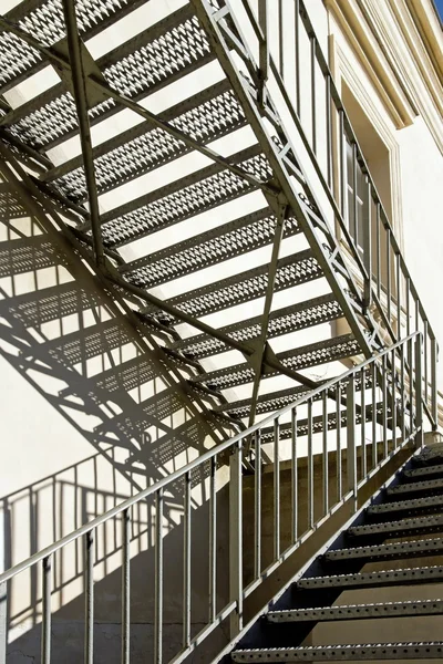 Fire escape in metal. Set of shade and light — Stock Photo, Image