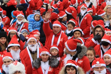 Parade of Santa Clauses in the center of Almaty in honor of the New Year, Kazakhstan 26.12.2015.