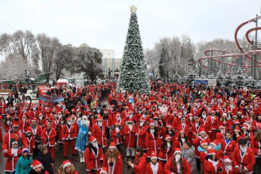 Parade of Santa Clauses in the center of Almaty in honor of the New Year, Kazakhstan 26.12.2015.
