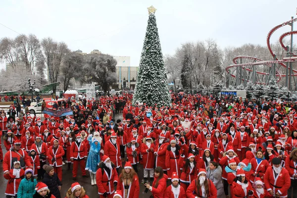 Parade of Santa Clauses in the center of Almaty in honor of the New Year, Kazakhstan 26.12.2015.