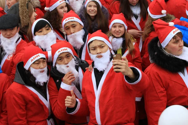 Parade of Santa Clauses in the center of Almaty in honor of the New Year, Kazakhstan 26.12.2015.