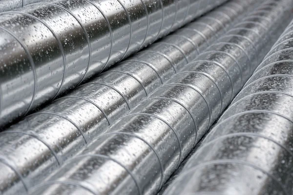 Mucchio di tubi metallici — Foto Stock