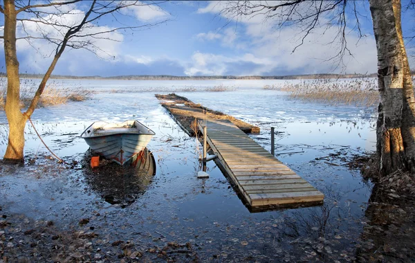 Boat in early spring — Stock Photo, Image