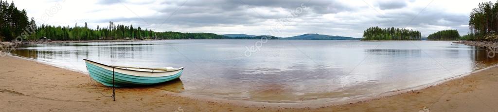 Beach with moored boat