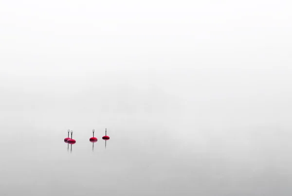 Dört kırmızı bouys — Stok fotoğraf