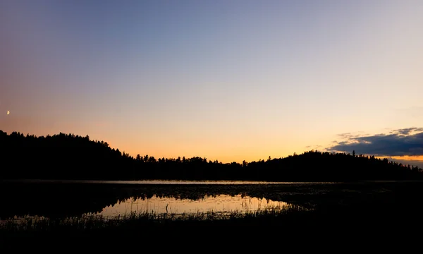 Lac au coucher du soleil — Photo