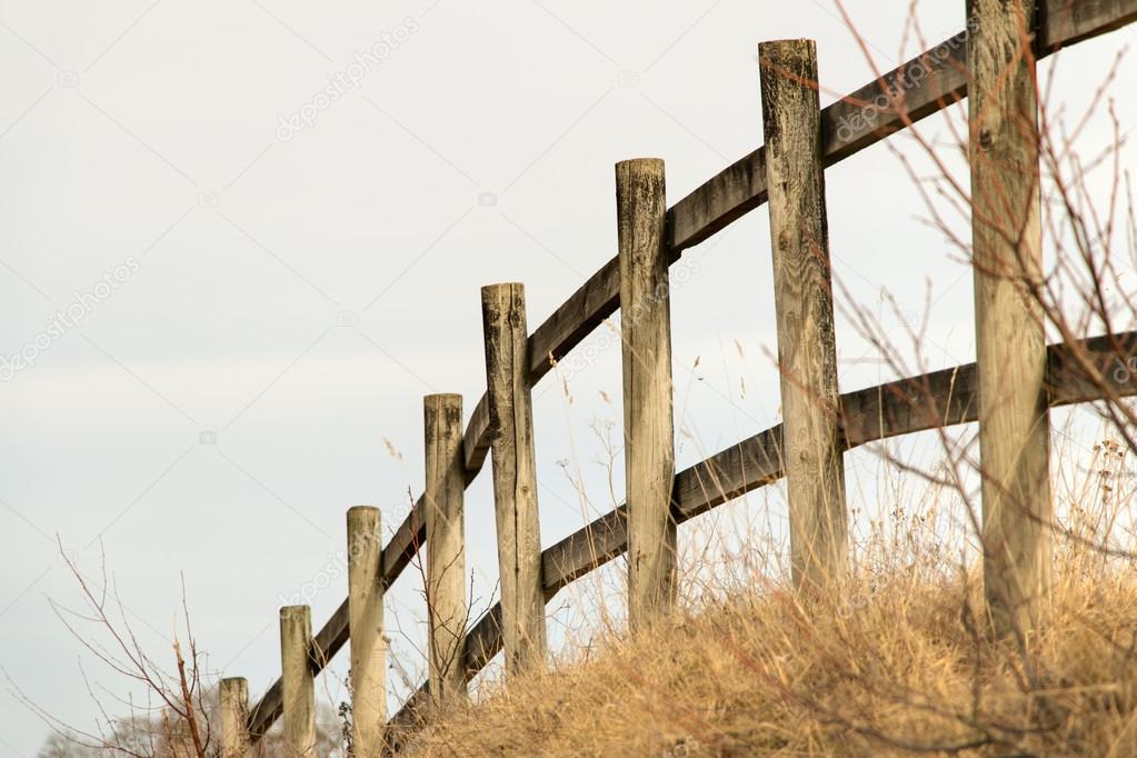  wooden fence in rural landscape