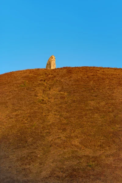 Standing stone on hill — Stock Photo, Image