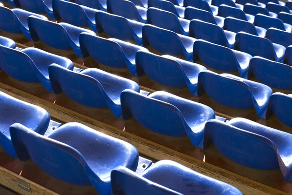 Empty blue seats at sports stadium — Stock Photo, Image