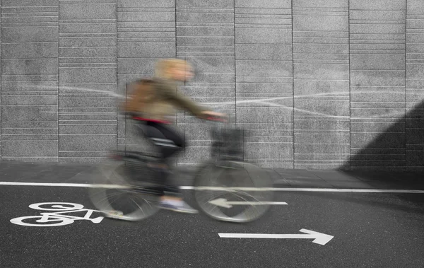 Cyclist in blurred motion — Stock Photo, Image