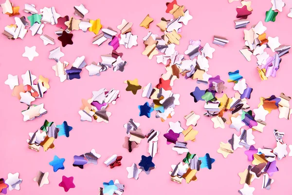 Bright Colorful Star Shaped Confetti Sparkles Pink Background Theme Holiday Stockbild