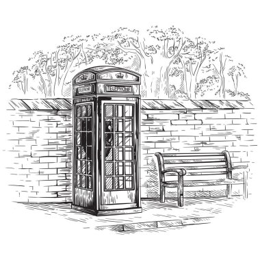 Londra telefon kulübesinde tuğla bir duvarda.