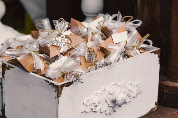 Elegant party favors with vintage box — Stock Photo, Image