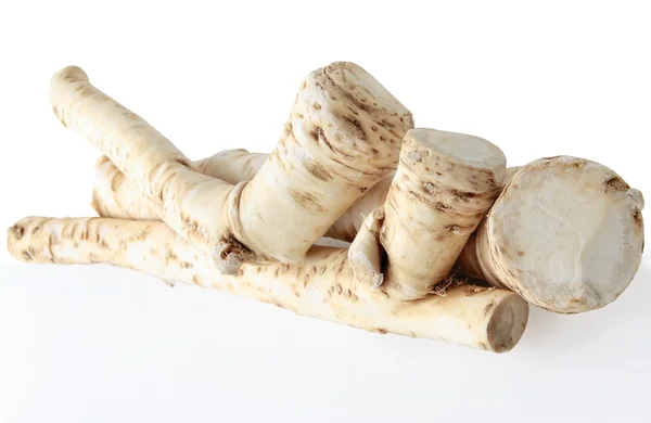 Horseradish roots as spicy vegetable and condiment for sauce — Stock Photo, Image