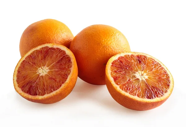 Orangen mit rotem Saft — Stockfoto