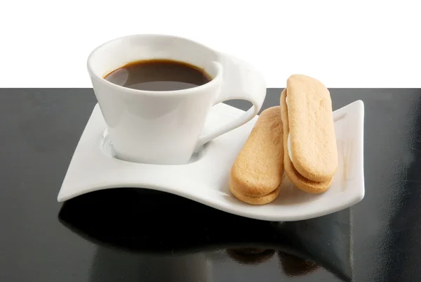 Tasse de café chaud et gâteaux — Photo