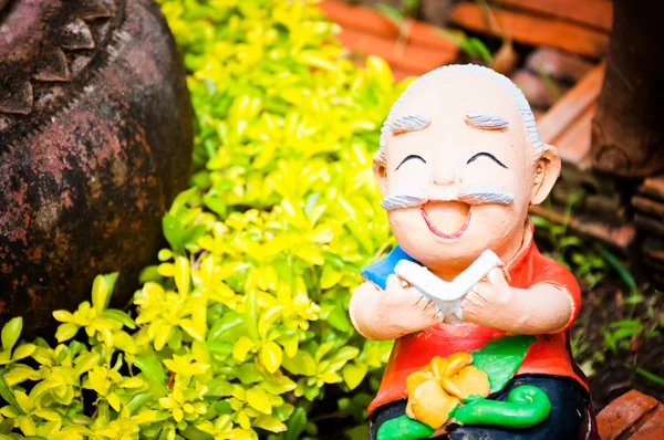 Sculpture sourire décorer dans le jardin — Photo