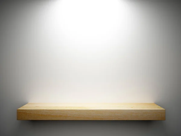 Полка из дерева на белой стене — стоковое фото